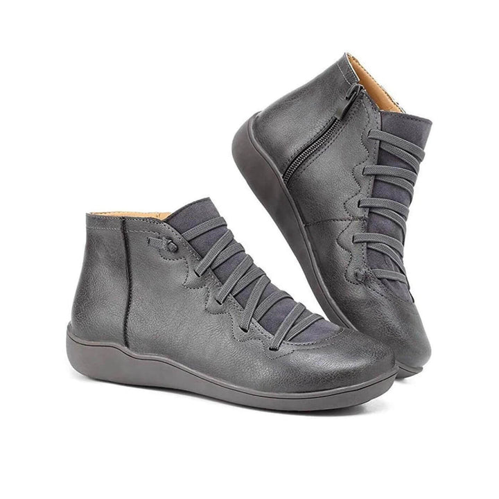 Eleganti stivaletti grigi da donna, scarpe comode con tacco stabile, per un look di moda quotidiano.