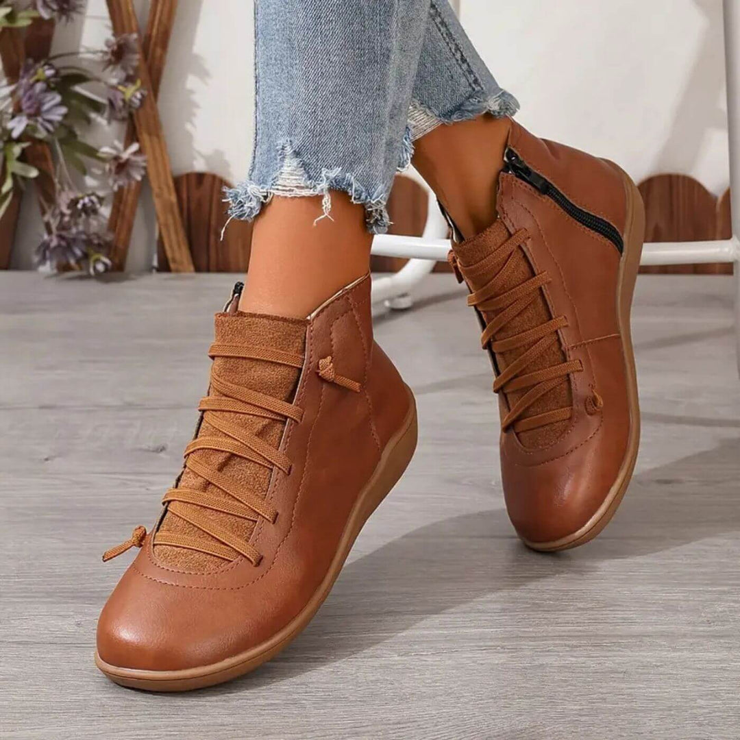 Stivaletti donna neri, design elegante e confortevole, ideali come scarpe versatili con tacco stabile.