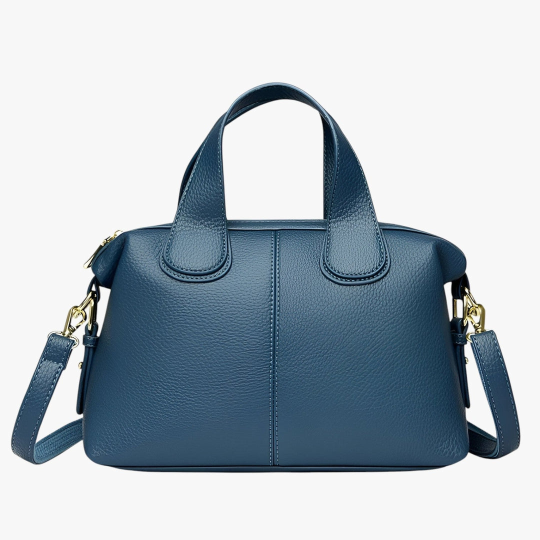 Borsa a mano nera compatta, ideale per la donna moderna che cerca eleganza e praticità.