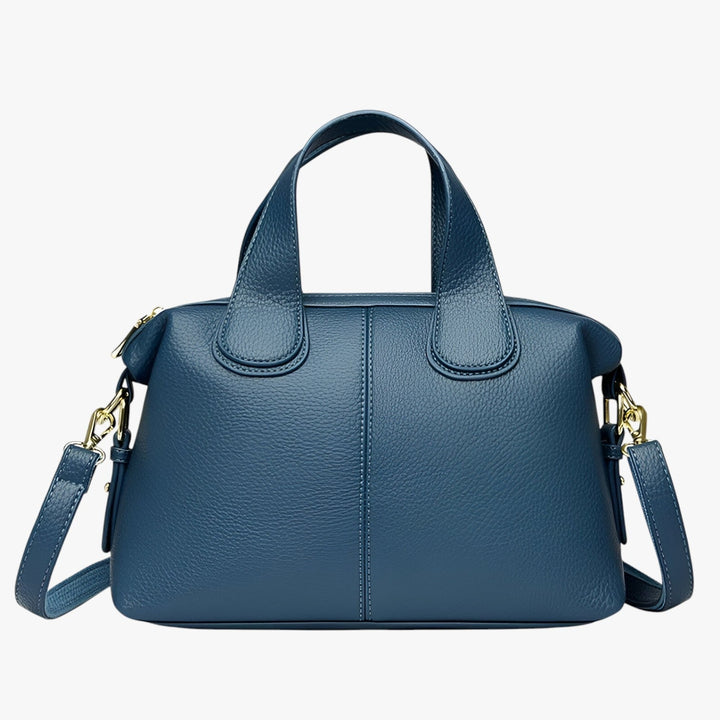 Borsa a mano nera compatta, ideale per la donna moderna che cerca eleganza e praticità.