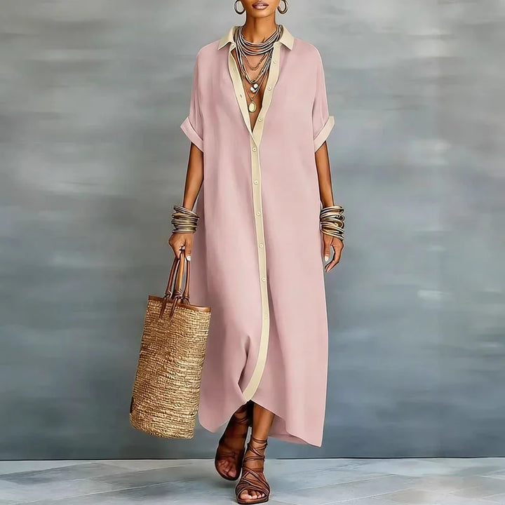 Abito chemisier lungo da donna di tendenza, con bottoni e vestibilità ampia, ideale per un outfit casual elegante.