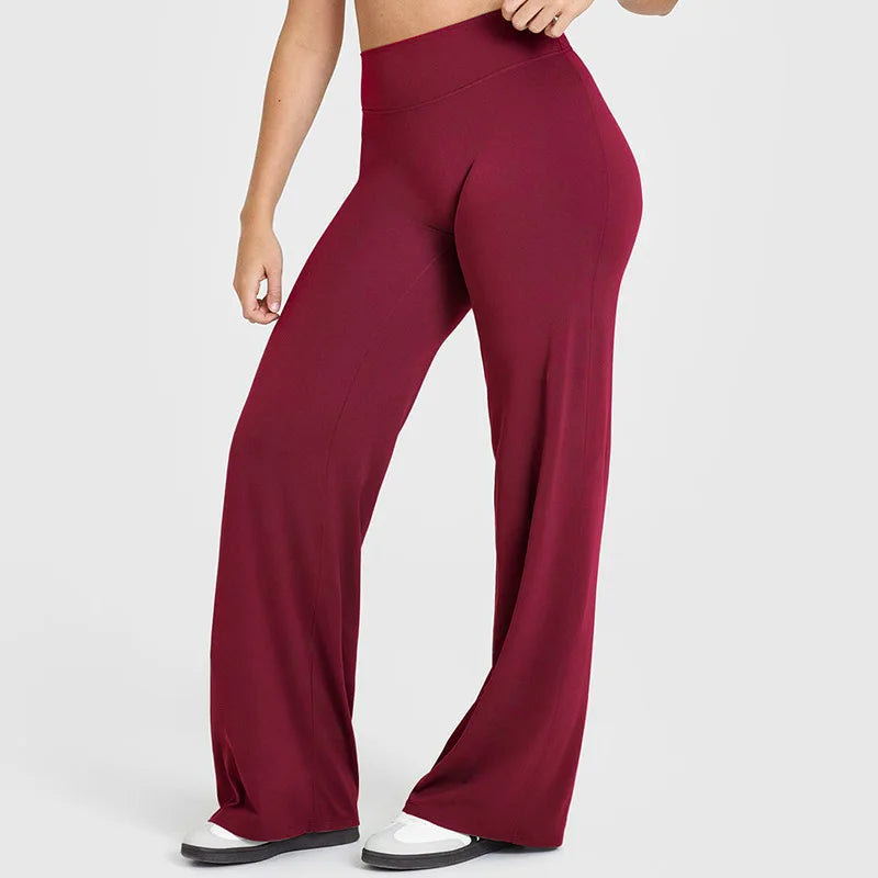 Pantaloni yoga donna vita alta, gamba ampia, neri per comfort e flessibilità in ogni movimento.