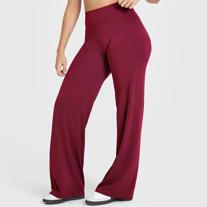 Pantaloni yoga donna vita alta, gamba ampia, neri per comfort e flessibilità in ogni movimento.