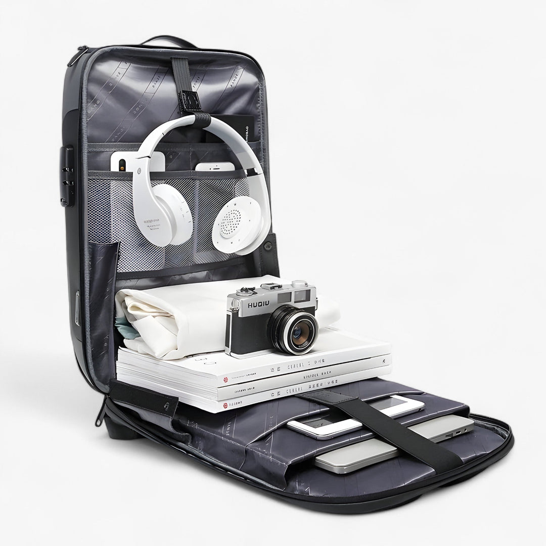 Zaino da viaggio uomo porta laptop grigio, spazioso e funzionale con porta USB integrata.