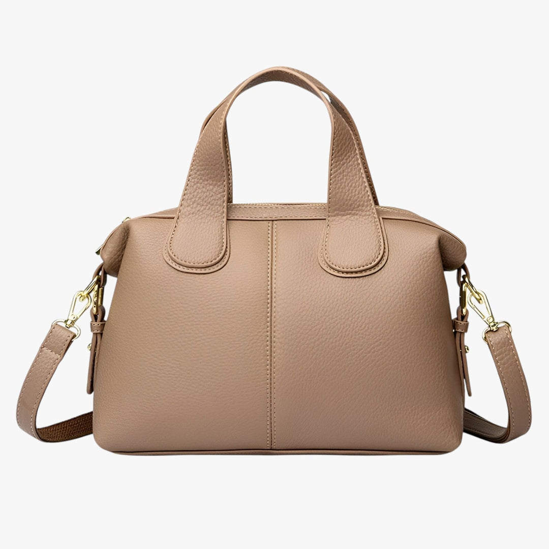 Accessorio moda: borsa a mano nera elegante per donna, compatta e perfetta per un look sofisticato.