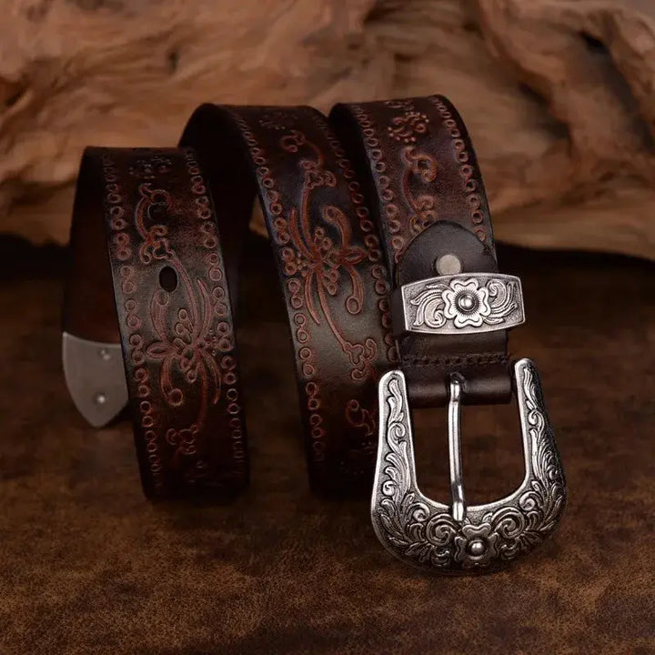 Cintura da uomo in vera pelle resistente, stile western classico, con fibbia decorata per un tocco di eleganza.