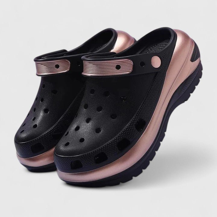 Sandali ortopedici donna neri con plateau, offrono comfort e sostegno per camminata ammortizzata. Ideali per il benessere del piede.