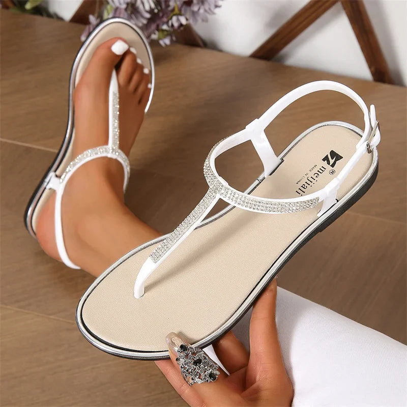 Infradito donna eleganti con strass e design T-strap, scarpe luminose e raffinate.