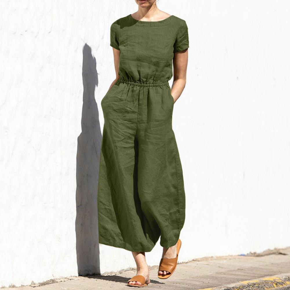 Tuta estiva donna elegante a gamba larga, girocollo, tinta unita. Perfetta per un outfit casual e comodo.