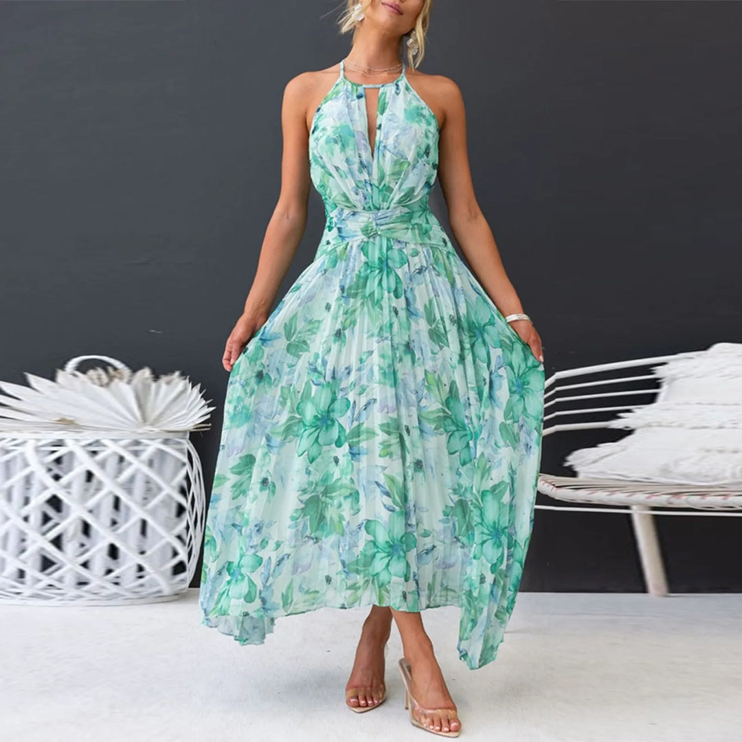 Abito donna maxi verde floreale boho. Collo halter per un look chic e confortevole, ideale per la moda estiva.