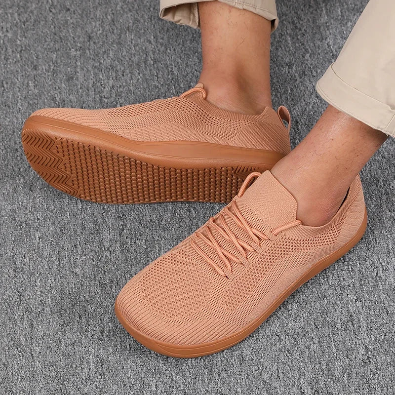 Dettaglio laterale sneakers uomo traspiranti. Tomaia in mesh per leggerezza e comfort.