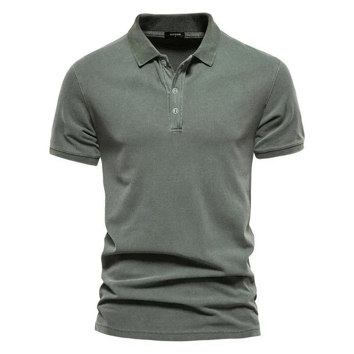 Camicia uomo manica lunga con bottoni, blu scuro. Eleganza versatile per abbigliamento ufficio e occasioni formali.