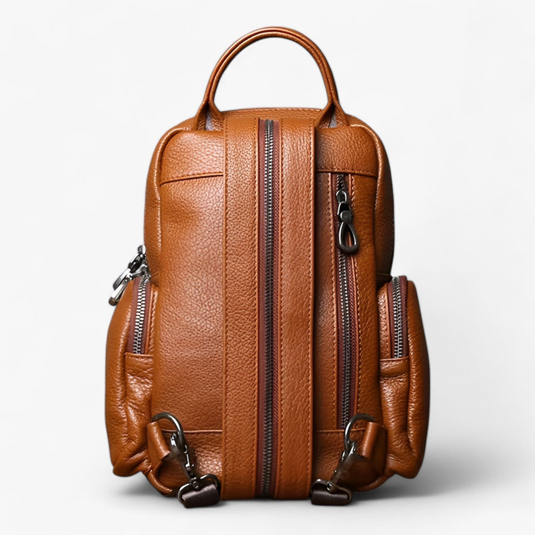 Zaino nero per donna con molteplici tasche, convertibile in borsa. Stile e funzionalità garantiti.