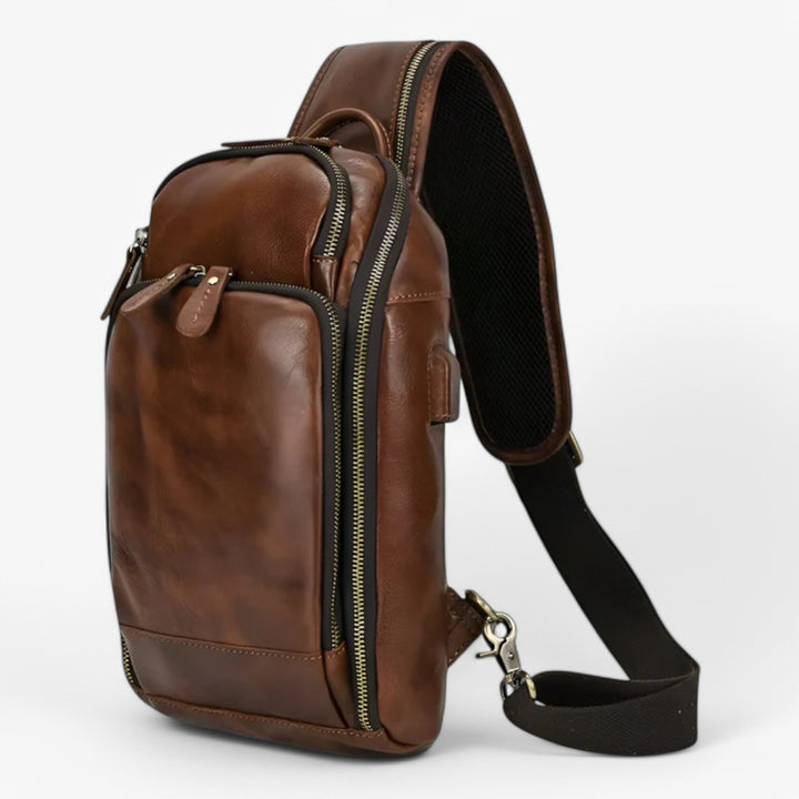 Borsello uomo multiscomparto marrone caffè, perfetto per organizzare accessori da viaggio e personali.