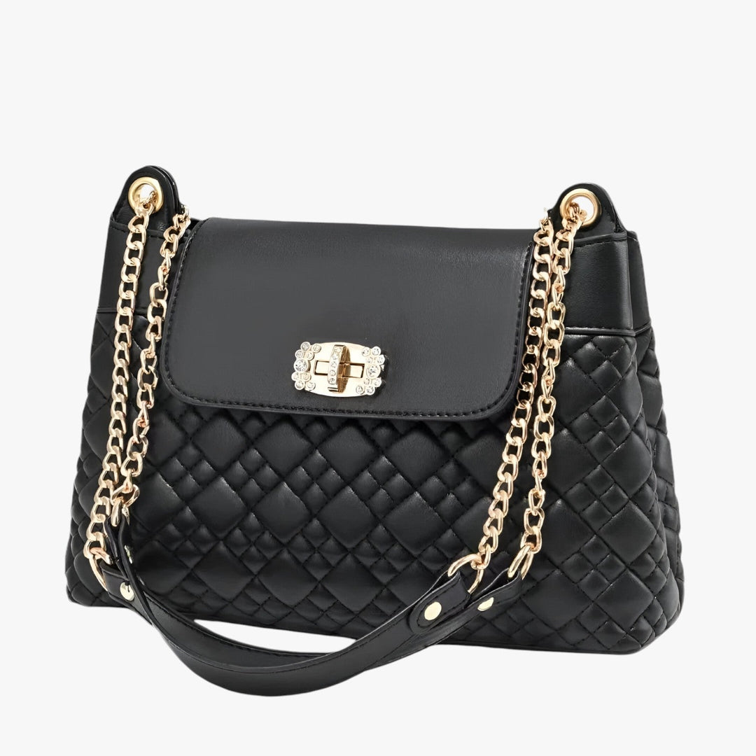 Borsa a secchiello donna trapuntata, elegante e versatile, con tracolla a catena. Perfetta per il quotidiano.