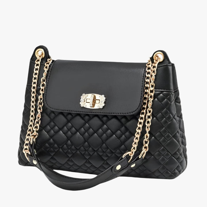 Borsa a secchiello donna trapuntata, elegante e versatile, con tracolla a catena. Perfetta per il quotidiano.