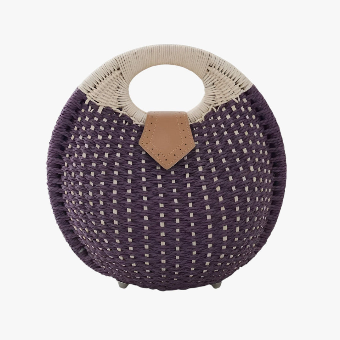 Elegante borsa a mano gialla intrecciata per donna, ideale per completare outfit estivi chic e trendy.