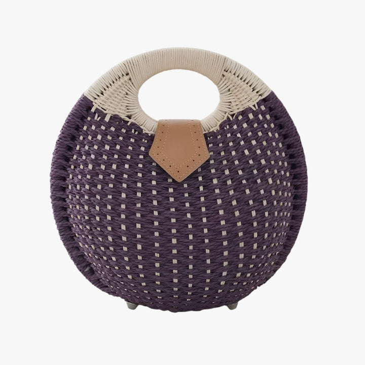 Elegante borsa a mano gialla intrecciata per donna, ideale per completare outfit estivi chic e trendy.
