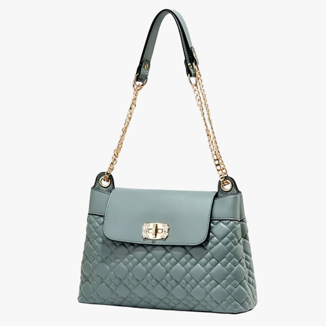 Borsa a secchiello donna, stile trapuntato con tracolla a catena. L'accessorio moda essenziale e pratico.