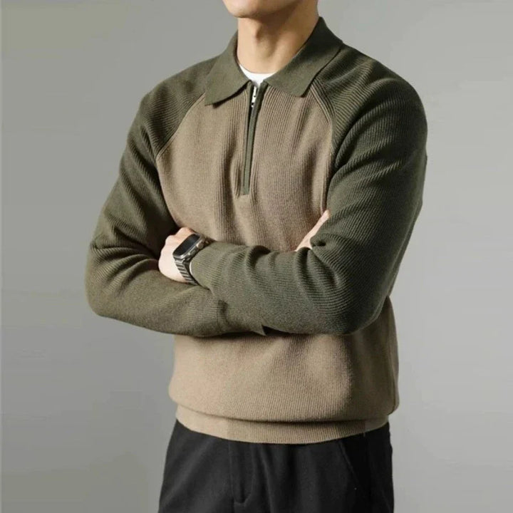 Maglione uomo con zip, collo polo e maniche raglan. Stile casual chic per ogni occasione.