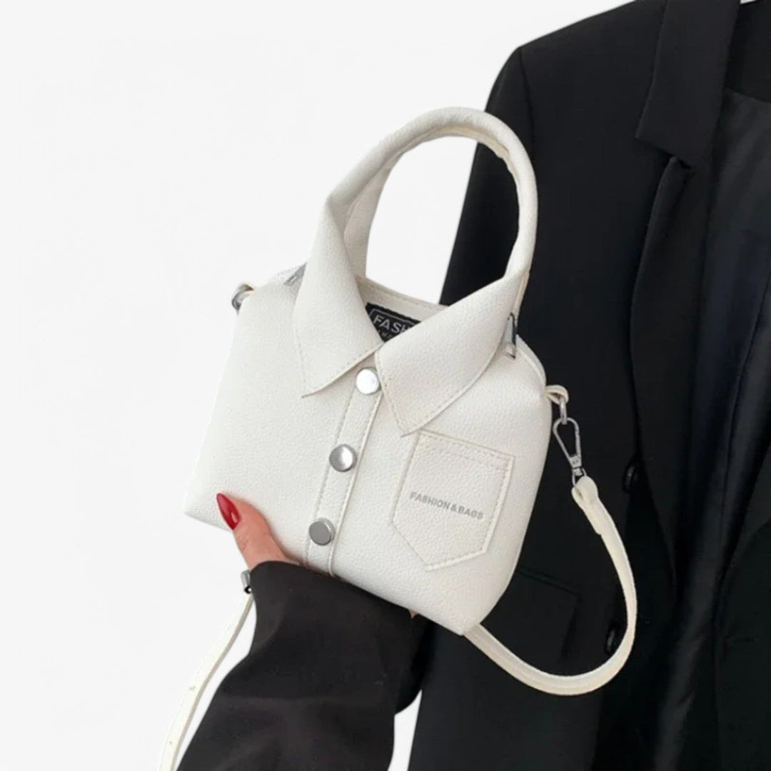 Accessorio moda donna: borsa a mano compatta multicolore che unisce stile casual ed elegante.