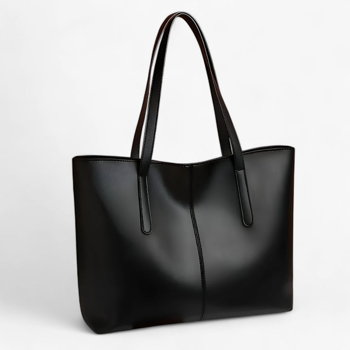 Borsa tote donna verde bottiglia, elegante e capiente, perfetta per accessori moda e uso quotidiano.