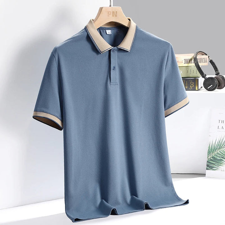 Polo uomo manica corta con profili a contrasto, ideale per un look casual-elegante e una vestibilità sartoriale.