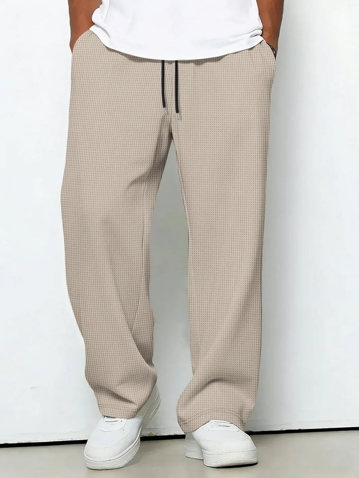 Pantaloni uomo casual-eleganti, essenziali per la moda maschile. Perfetti per outfit quotidiani e stile versatile.