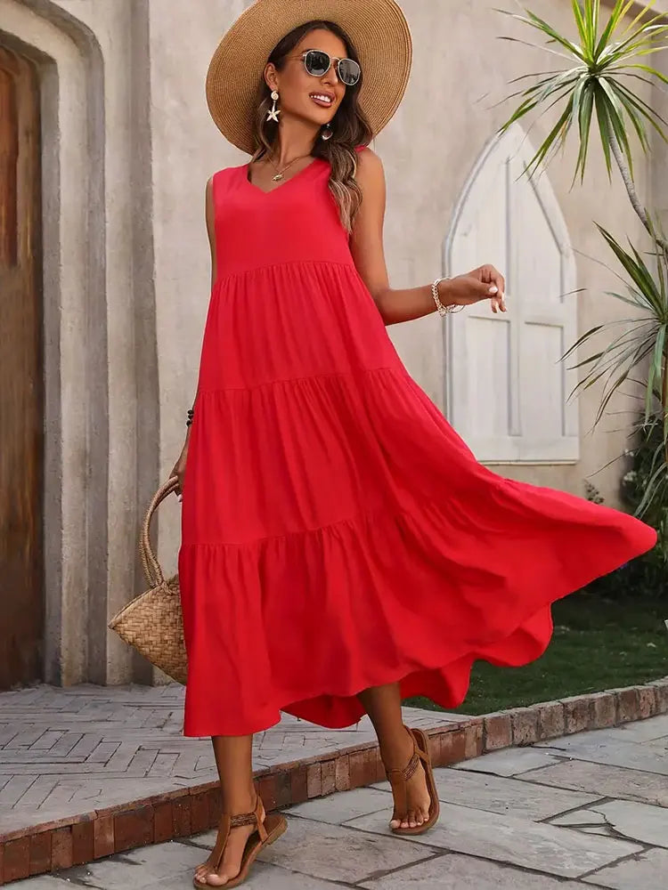 Abito lungo donna, design estivo casual con balze e scollo a V. Comfort e stile in un unico capo.