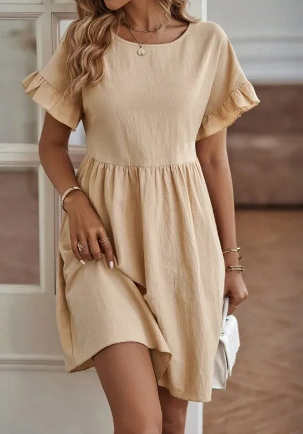 Mini abito donna casual chic con scollo tondo, ideale per vestito estivo leggero e moda primavera.