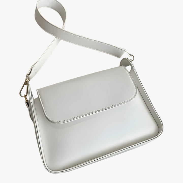 Borsa a tracolla compatta donna. Versatile per look quotidiani, stile alla moda e massima praticità.