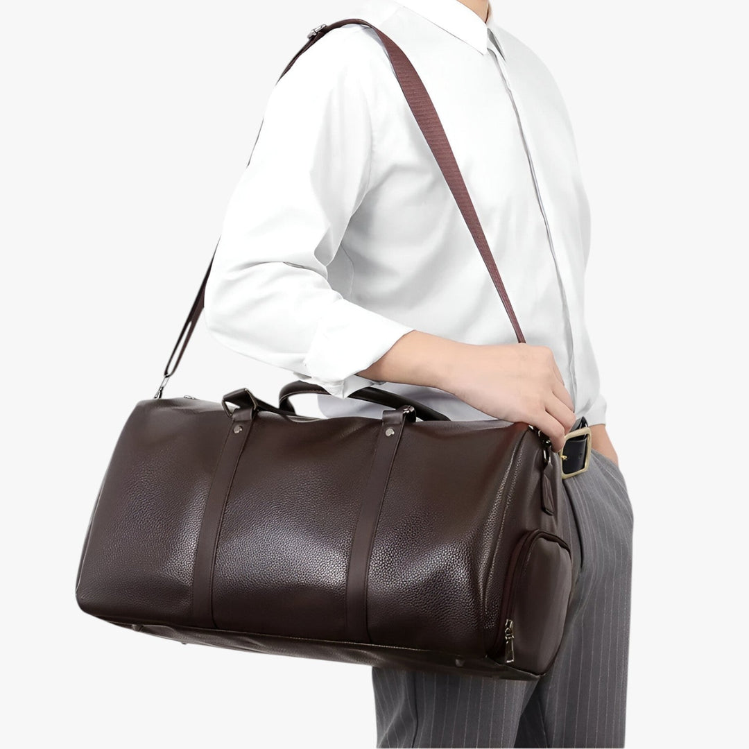 Borsa da viaggio nera capiente per uomo, con tracolla regolabile, perfetta per weekend.