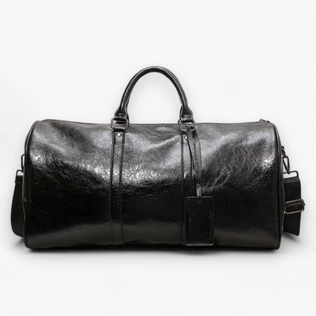 Borsone da viaggio donna nero, capiente ed elegante, ideale per weekend e brevi vacanze con stile.