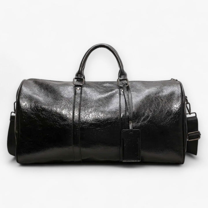 Borsone da viaggio donna nero, capiente ed elegante, ideale per weekend e brevi vacanze con stile.