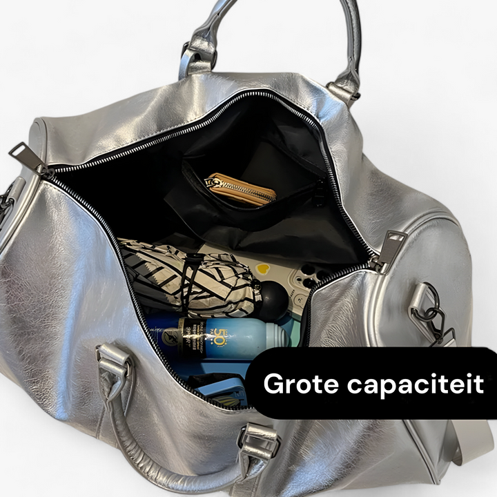 Borsa da viaggio donna capiente, design elegante in nero, perfetta per ogni avventura.