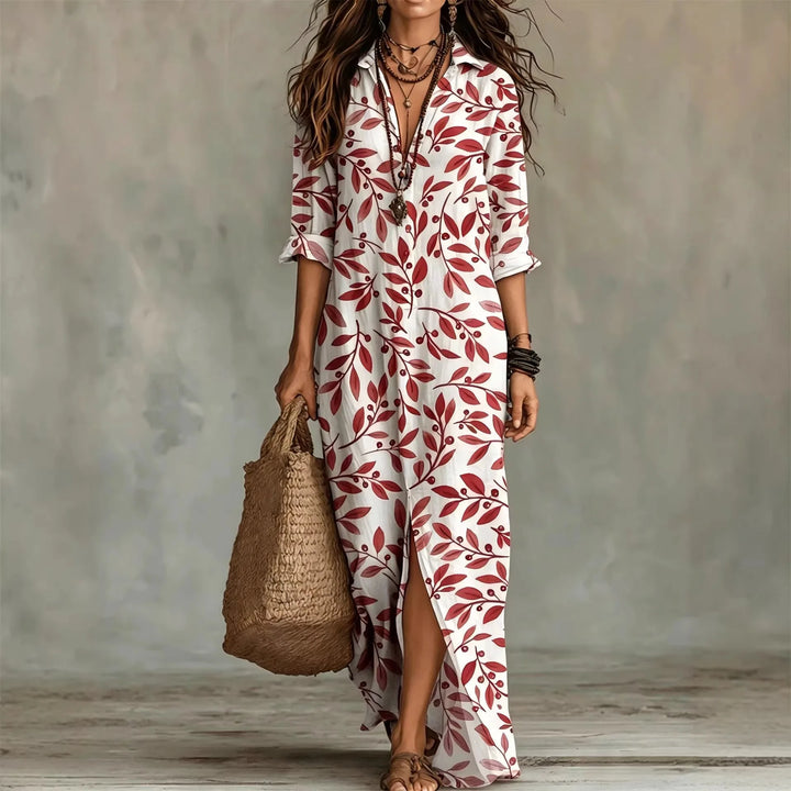 Abito da donna modello chemisier con raffinata stampa botanica, unisce eleganza e freschezza per il tuo look estivo.