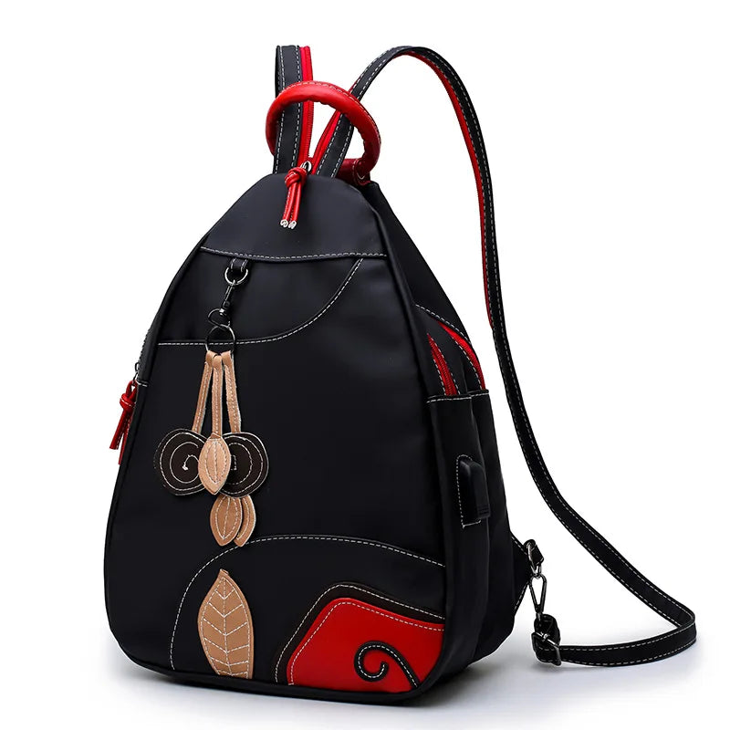 Zaino da viaggio compatto nero per donna, leggero ed elegante. Ideale per weekend e come bagaglio a mano pratico.