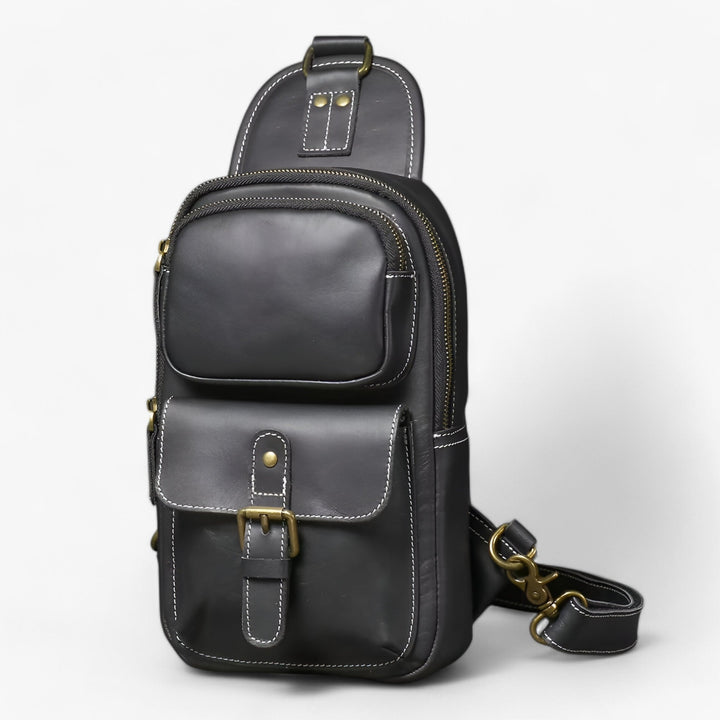 Borsa monospalla nera per uomo, versatile e con design multiscomparto, accessorio essenziale per la vita quotidiana.