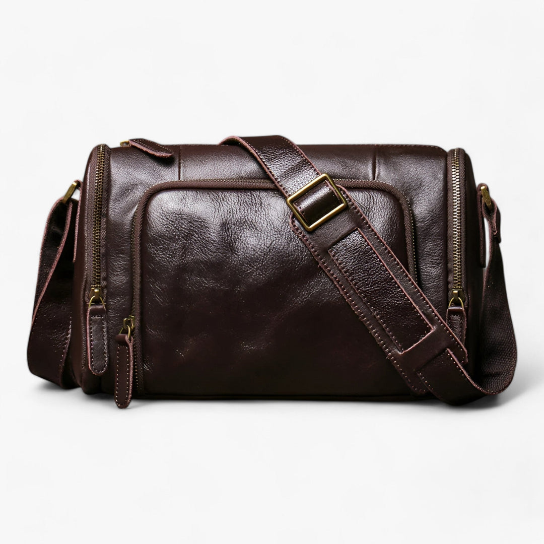 Elegante borsa messenger unisex nera, accessorio pratico in sintetico per un look quotidiano e organizzato.