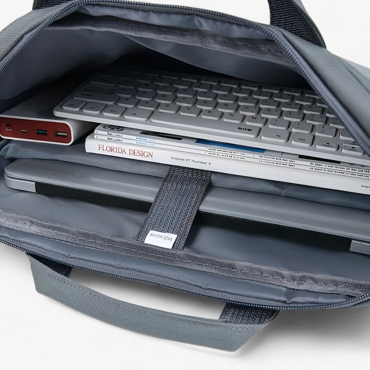 Borsa uomo rossa versatile con tracolla removibile per laptop, adatta per lavoro, viaggio e uso quotidiano.