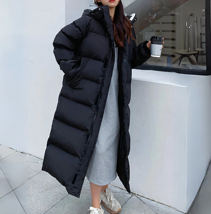 Giacca invernale donna oversize con cappuccio, piumino lungo e confortevole per l'abbigliamento moda.