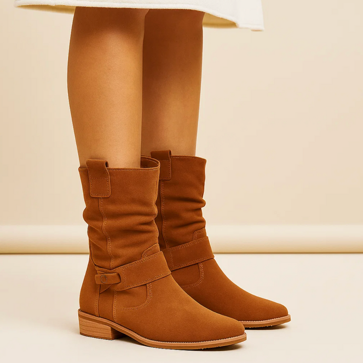 Stivaletti casual-eleganti da donna con tacco basso e zip, perfetti per la moda inverno.