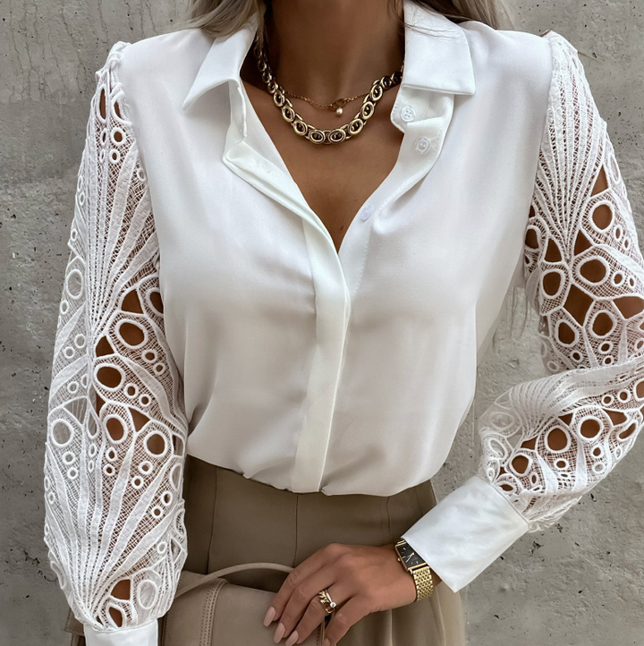 Camicetta donna elegante a maniche lunghe con colletto strutturato. Blusa versatile con vestibilità comoda, per ufficio.