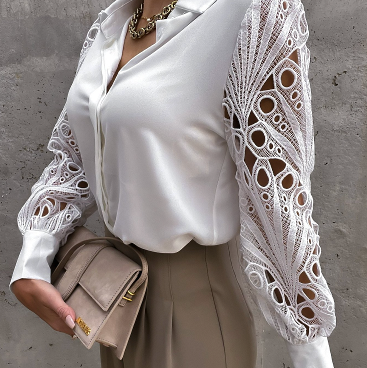 Camicetta donna con colletto strutturato, maniche lunghe e vestibilità comoda. Blusa elegante e versatile per ogni look.