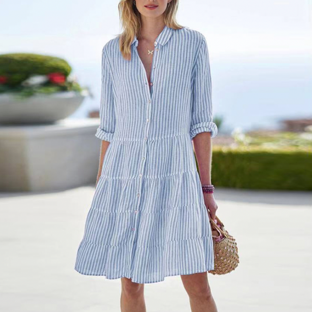 Elegante abito estivo midi da donna, leggero e fluente, ideale per un look chic e confortevole.