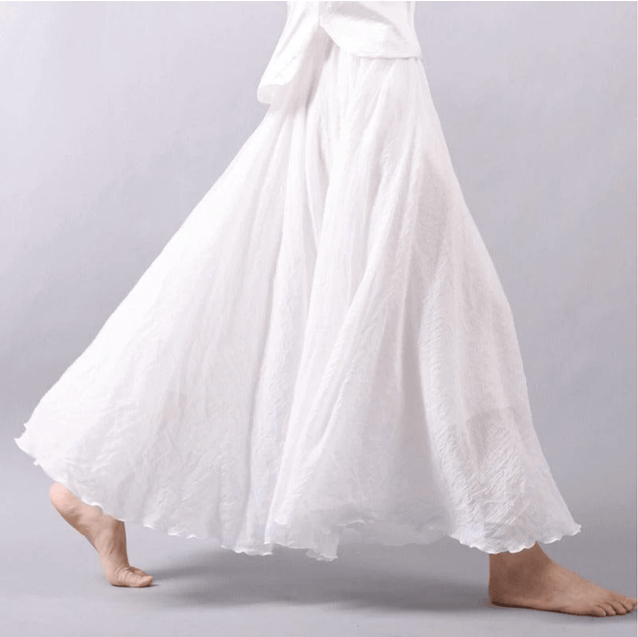 Gonna lunga donna fluida stile boho A-line, perfetta per un look estivo casual chic e versatile.