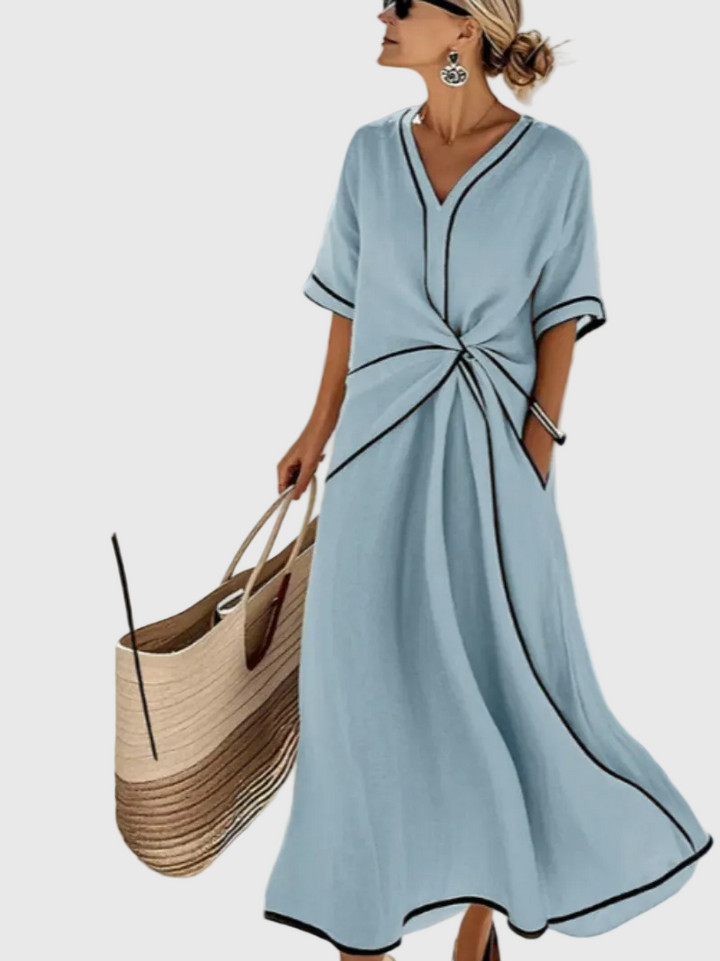 Abito lungo elegante e drappeggiato da donna per serate autunnali. Perfetto per cerimonie, vestibilità comoda e versatile.