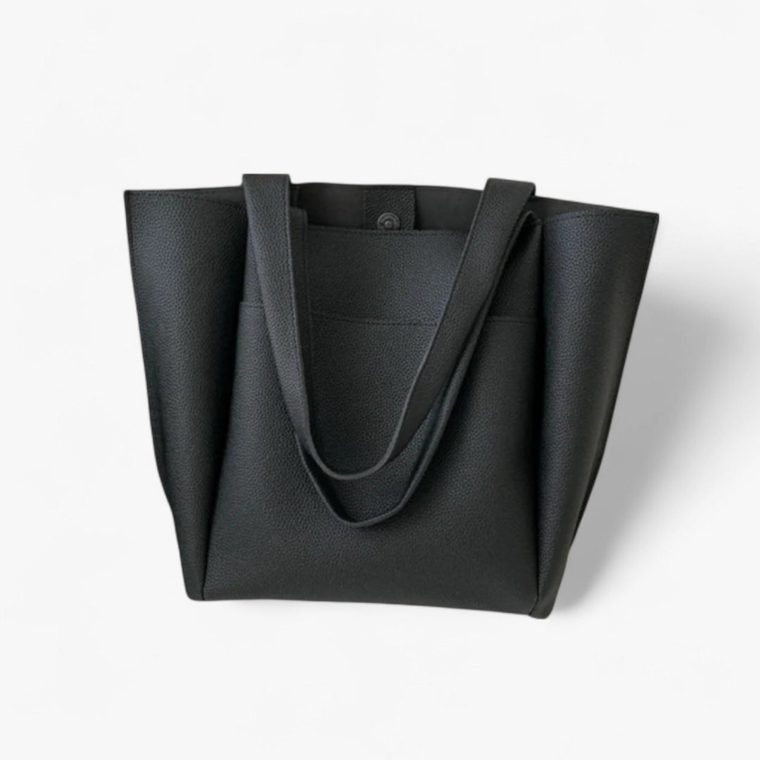 Borsa tote donna dal design raffinato, capiente e funzionale. L'accessorio perfetto per ogni occasione elegante.