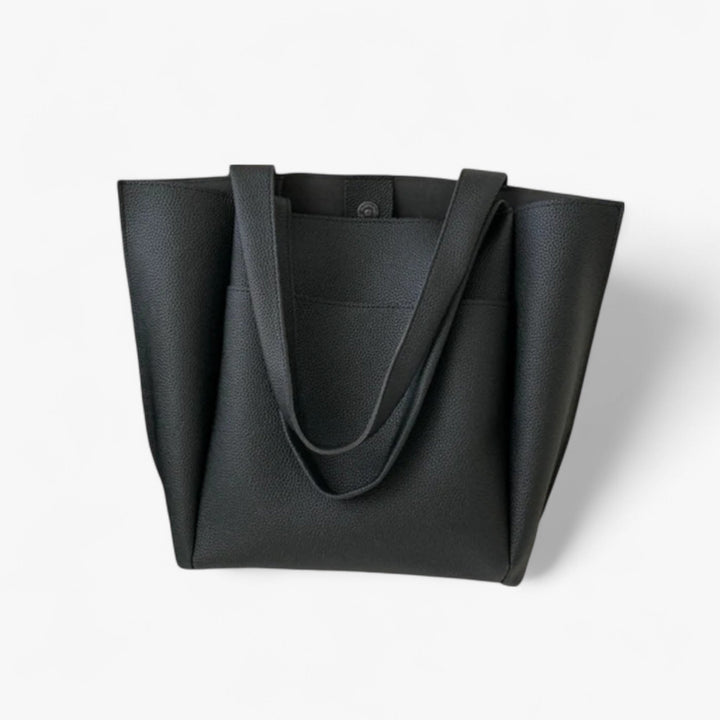 Borsa tote donna dal design raffinato, capiente e funzionale. L'accessorio perfetto per ogni occasione elegante.
