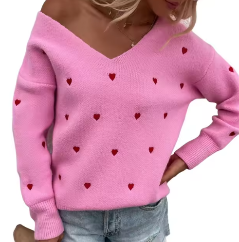 Maglione donna autunno inverno, scollo a V e motivo cuore. Maglieria elegante e confortevole.